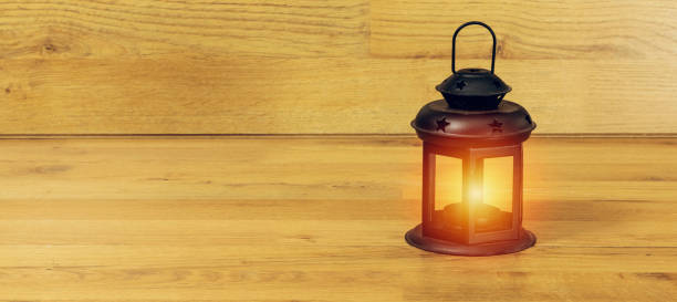 istock Ornamental Arabic lantern with burning candle glowing. Festive greeting card. Invitation for Muslim holy month or christmas, halloween holidays 1283219406