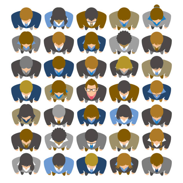 High angle view of businessman looking up and standing in large group of business people Overhead view of unique business man standing out from the crowd. well dressed man standing stock illustrations