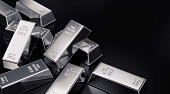 Silver Bars Laying on Black Background