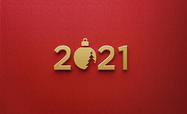 istock Christmas Concept-  2021 with A Golden Christmas Bauble on Red Background 1283225788