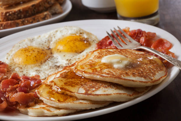 istock Grand Slam Breakfast with Pancakes, Bacon, Eggs, and Toast 1283225821