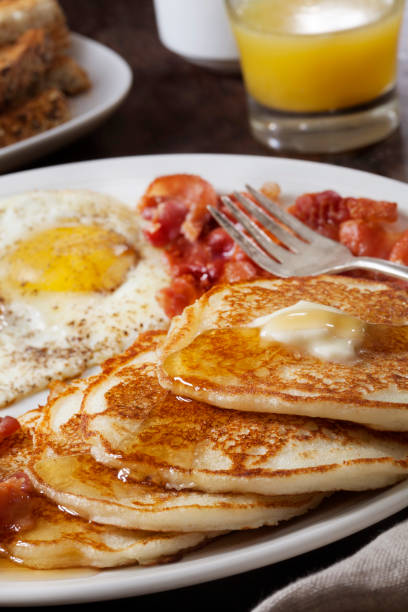 istock Grand Slam Breakfast with Pancakes, Bacon, Eggs, and Toast 1283226912