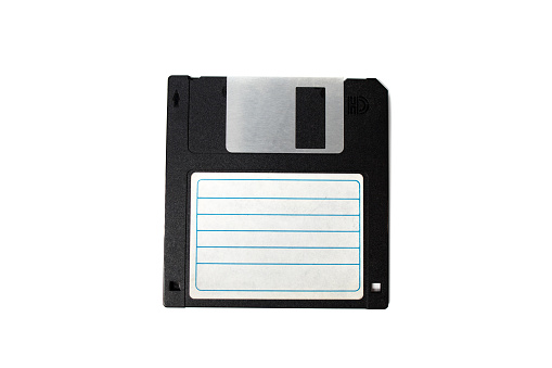 Closeup of a 3.5 inch floppy disk. Vintage computer items. Retro.