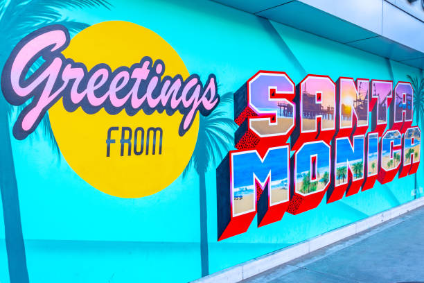 Santa Monica, California - October 09 2019: Public city banner - Greetings from Santa Monica. Outdoor sign and picture backdrop for tourists/ visitors in the famous California city coast.