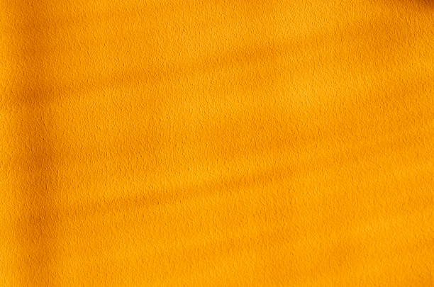 istock Background of sun light shadow over yellow textured wall 1283232958
