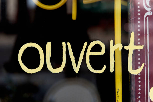 istock French signage ouvert in glass reflection. 1283233628