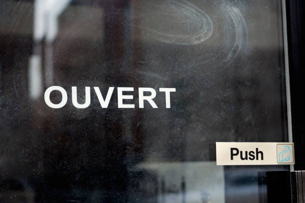 istock French signage ouvert in glass reflection. 1283233649