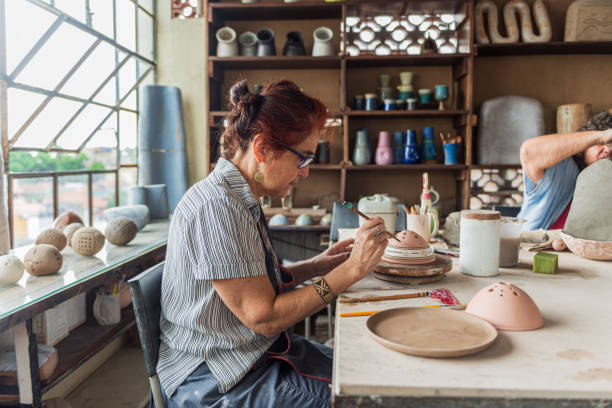 istock Senior female pottery artist 1283234855