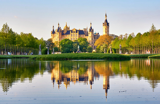 Schwerin, Germany - May 09, 2020: View across the water to Schwerin Castle. Mecklenburg-Vorpommern, Germany