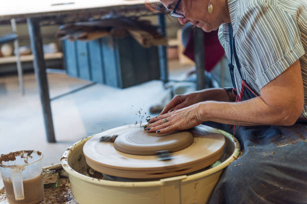 istock Senior female pottery artist 1283234912
