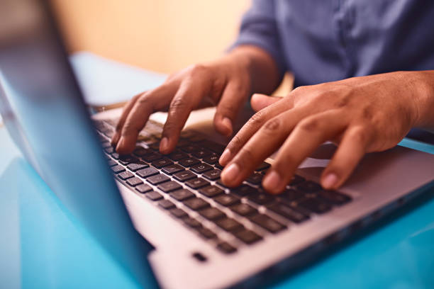 istock Man hands typing on laptop keyboard. on a desk 1283235092