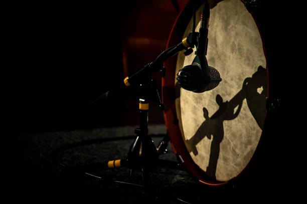 istock kick drum with microphone in low key, black isolated 1283237442