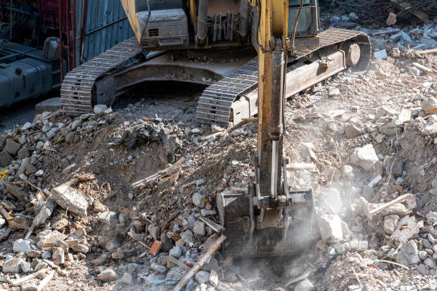 istock Yellow excavator is working on the construction site 1283238570