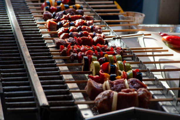istock Many barbecue sticks with meat and vegetables on barbecue grill 1283242826
