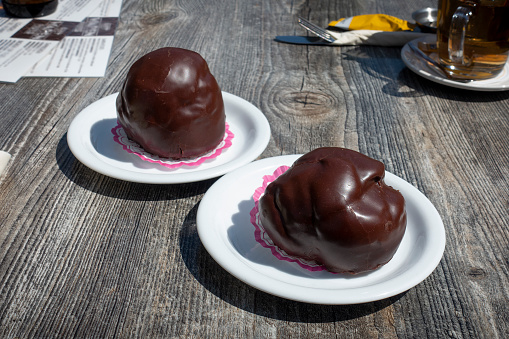 Bossche Bol, a typical Dutch pastry with chocolate and cream from the city of Den Bosch
