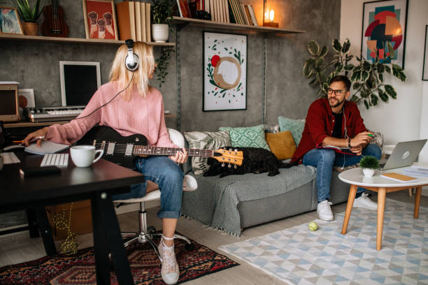 istock Woman composer writing a new song 1283247497