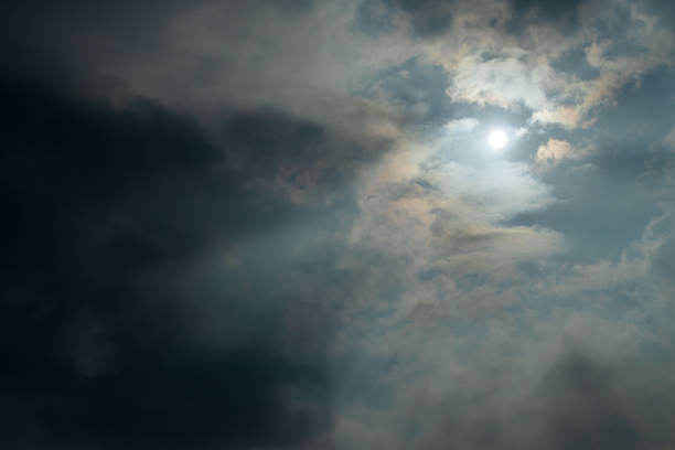istock Clouds over the sky with the sun shining through the afternoon. 1283252006