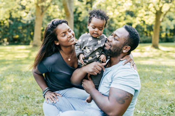 istock Authentic family enjoying time outdoor 1283257096