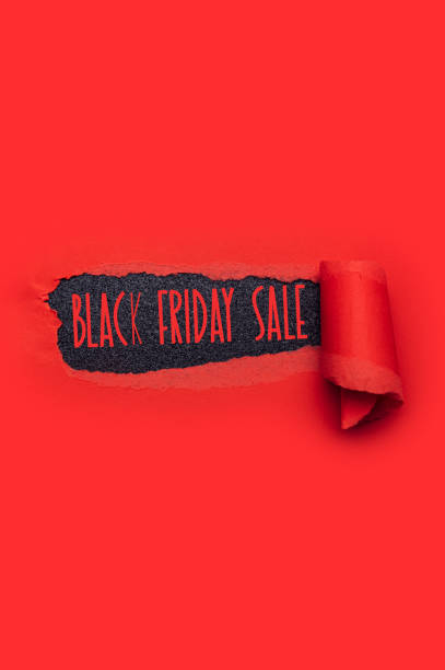 istock Black Friday Sale text in paper hole 1283257711