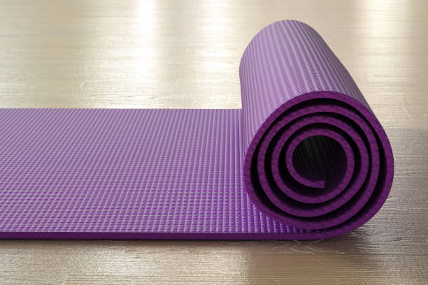 istock Purple yoga mat 1283258619
