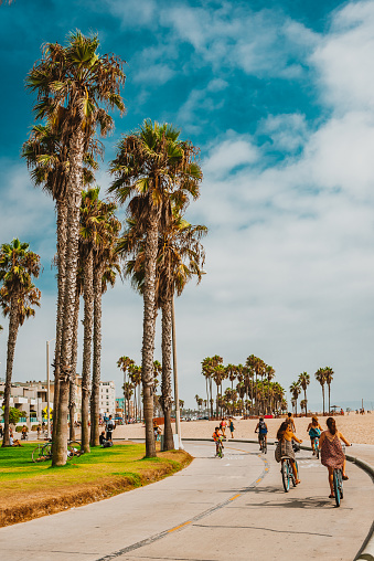 September 5th, 2017 – Los Angeles, USA: Venice Beach on a Sunny Day in Summer, USA – You can see people passing by on their bikes enjoying the last summer days