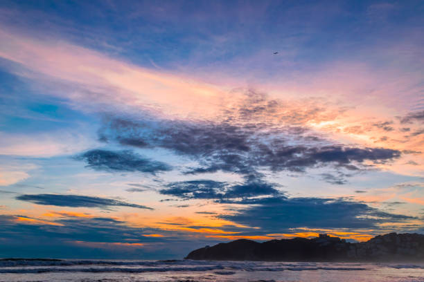 istock Beautiful warm sunset in acapulco's beach 1283265582