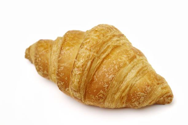 istock Croissant isolated on white background 1283268045
