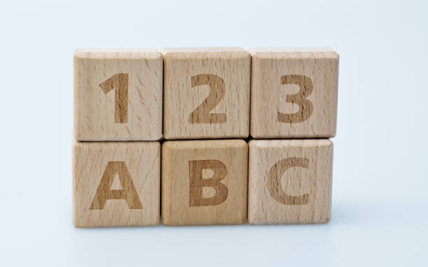 istock Wooden blocks with ABC and 123 1283270101