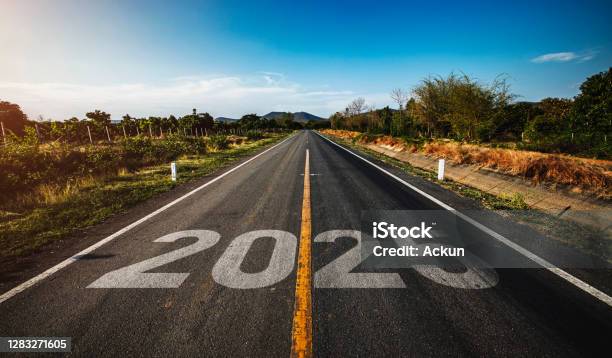 The Word 2025 Written On Highway Road In The Middle Of Empty Asphalt Road Stock Photo - Download Image Now