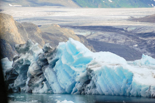 The ancient glacier makes its way down the mountains and into the Prince William Sound.  The frigid water of the sound creates stunning views.