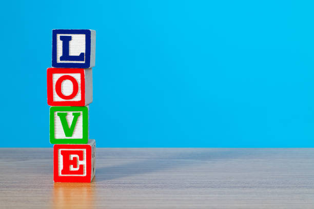 Wooden blocks with word love.