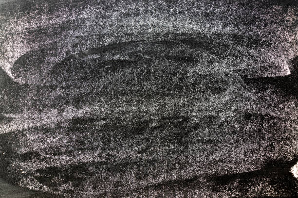 istock Grunge white color chalk textured on blank blackboard background with copy space 1283280130