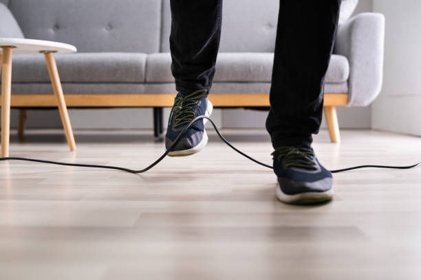 istock Stumble Over Cable. Clumsy Office Falldown 1283281314