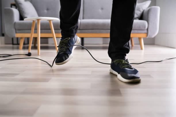 istock Stumble Over Cable. Clumsy Office Falldown 1283281315
