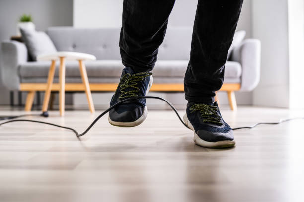 istock Stumble Over Cable. Clumsy Office Falldown 1283281320