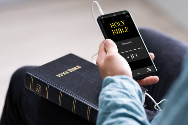 istock Christian Man Reading Bible Book And Praying 1283281322