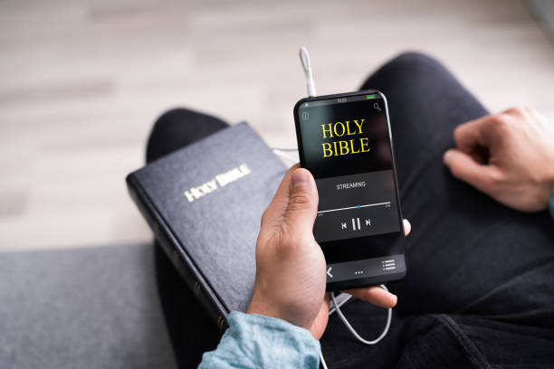 istock Christian Man Reading Bible Book And Praying 1283281324