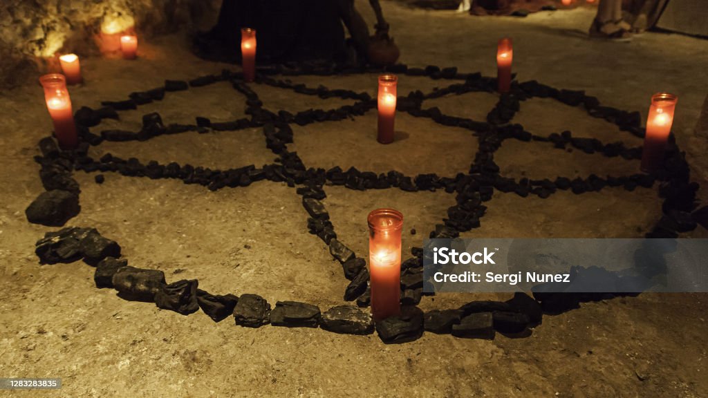 Satanic Tree Satanic Pentacle With Lighted Candles Stock Photo - Download Image Now ...