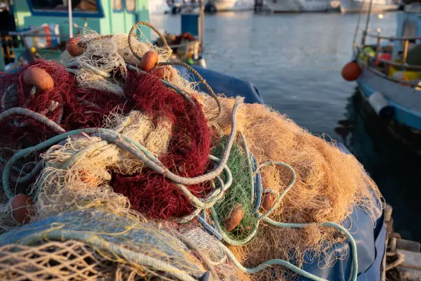 Fishing nets ropes and floats on a harbour. Fishnet on a basket. Latsi, Paphos
