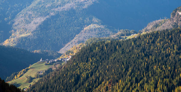 istock Mountain landscape with forest in the Italian alps. 1283285701
