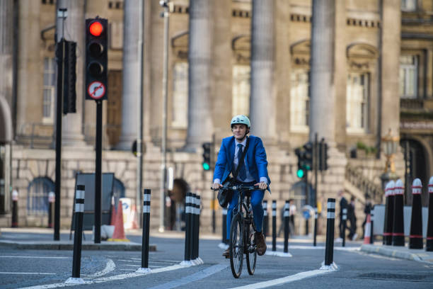 istock Self-sufficient mid adult London executive cycling to work 1283286369