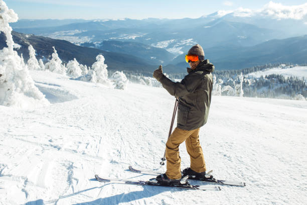 istock Nice young man skiing in the mountains. Active lifestyle in winter. 1283290074