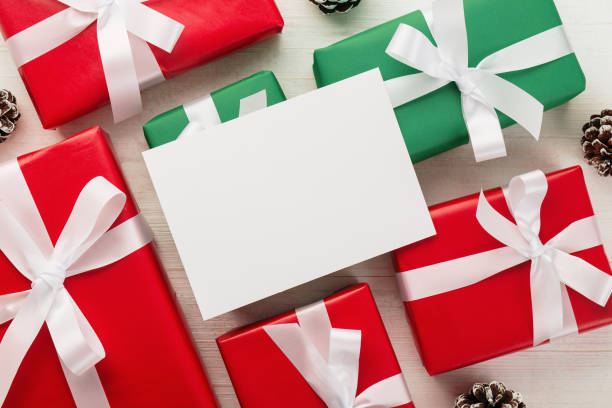 istock Merry christmas greeting card mockup template with giftbox 1283292484