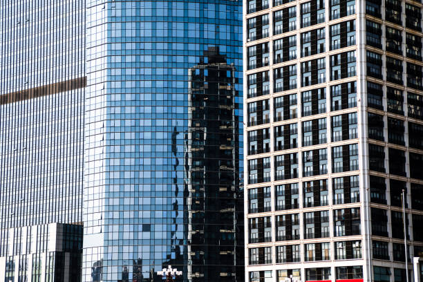 istock Closeup modern blue glass building 1283297298