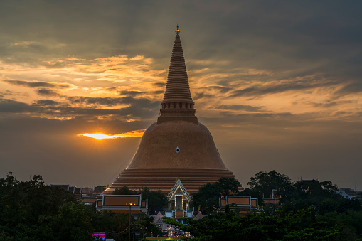 Phra Pathommachedi Stupa located in the Wat Phra Pathommachedi Ratcha Wora Maha Wihan in twilight, Nakhon Pathom Province, Thailand