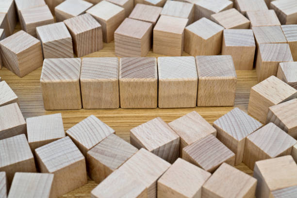 istock Wooden blocks in a row 1283297579