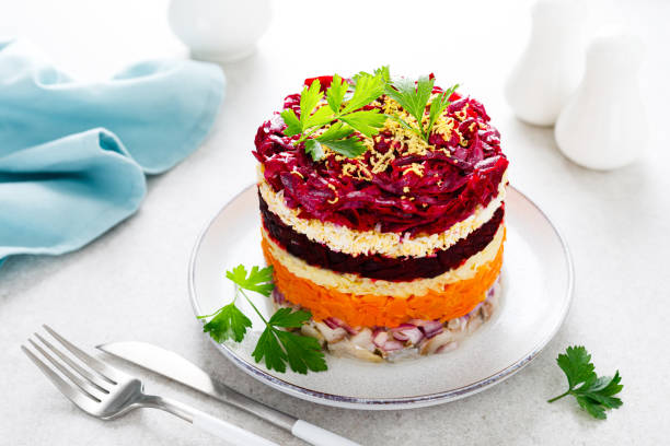 istock Layered shuba salad. Dressed herring, herring under a fur coat. Festive Christmas vegetable salad with fish and boiled vegetables. 1283301830