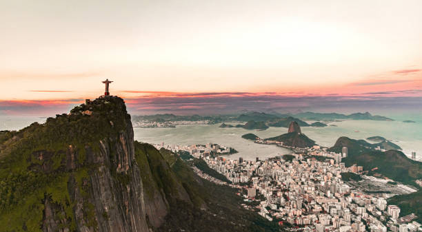 istock Christ the Redeemer statue in Rio de Janeiro (aerial shot) during a spectacular sunset 1283302197