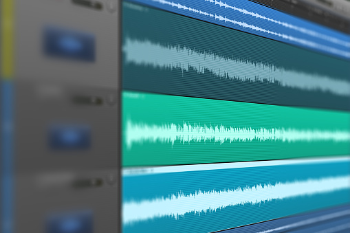 Image of multitrack sound audio wave on monitor. Recording, Mixing, and mastering in studio..