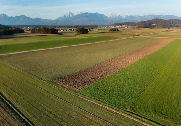 istock Plowed fields, pastures, villages and mountains 1283307729